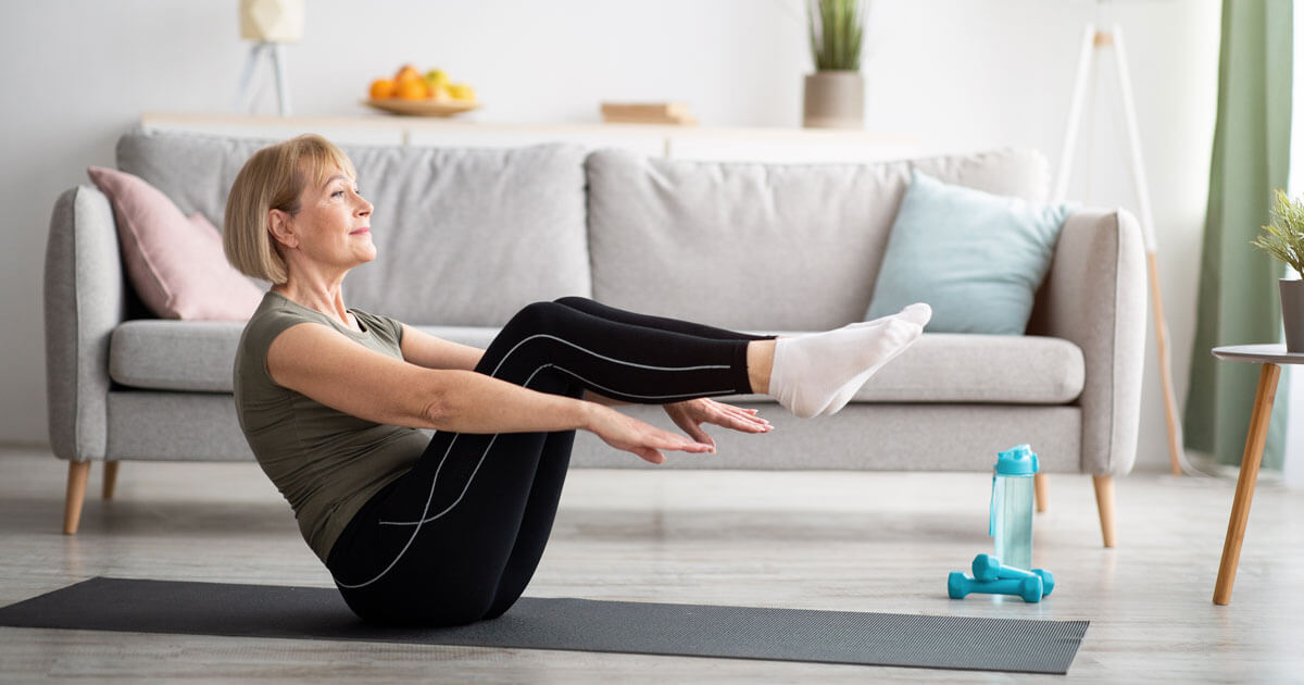 woman doing plank at home